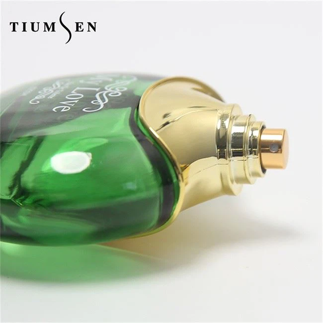 perfume in green handbag bottle