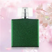 زجاجة عطر خضراء عتيقة